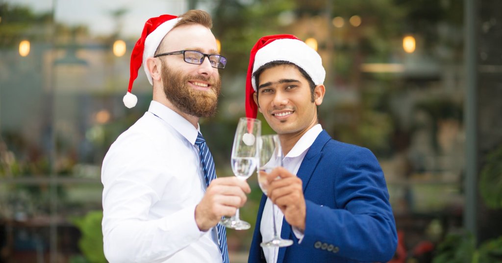 happy-excited-multi-ethnic-men-clinking-champagne-flutes2.jpg